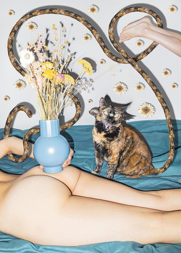 A naked person lies on their belly, seen from behind. A cat stands on the person’s back. The cat has two extra ears and three eyes, one positioned in the center of its forehead. What looks like snakes are actually the cat’s elongated tails. Many small flowers are attached to the wall. In the upper right corner, two feet enter the scene from outside the frame.
